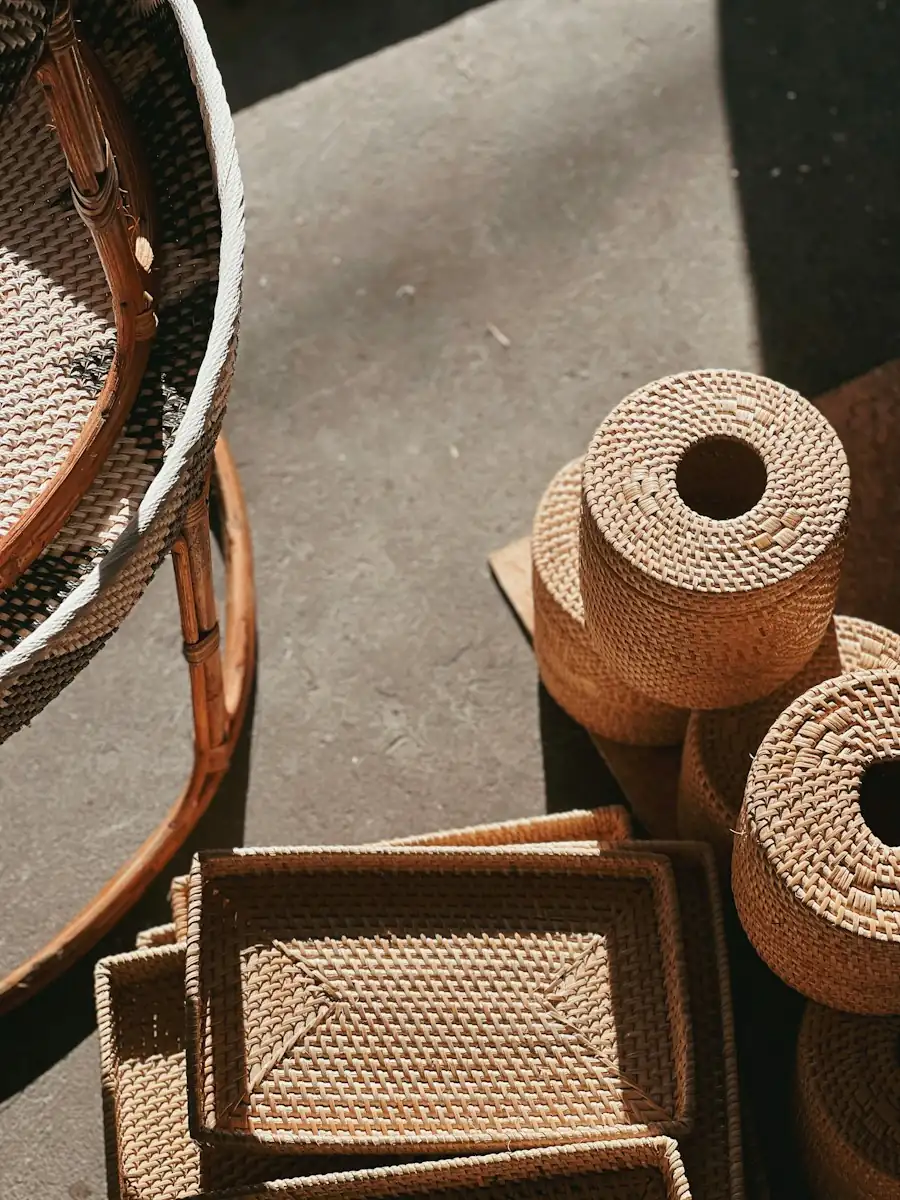 Rolls of raw rattan cane and woven blanks