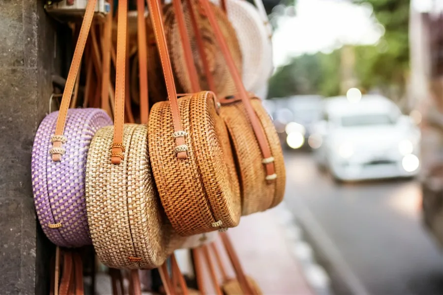 Rows of handwoven rattan bags hanging at a market stall